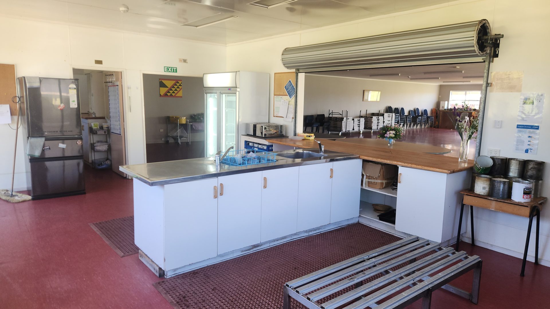 Wharekai kitchen with appliances and a serving counter.